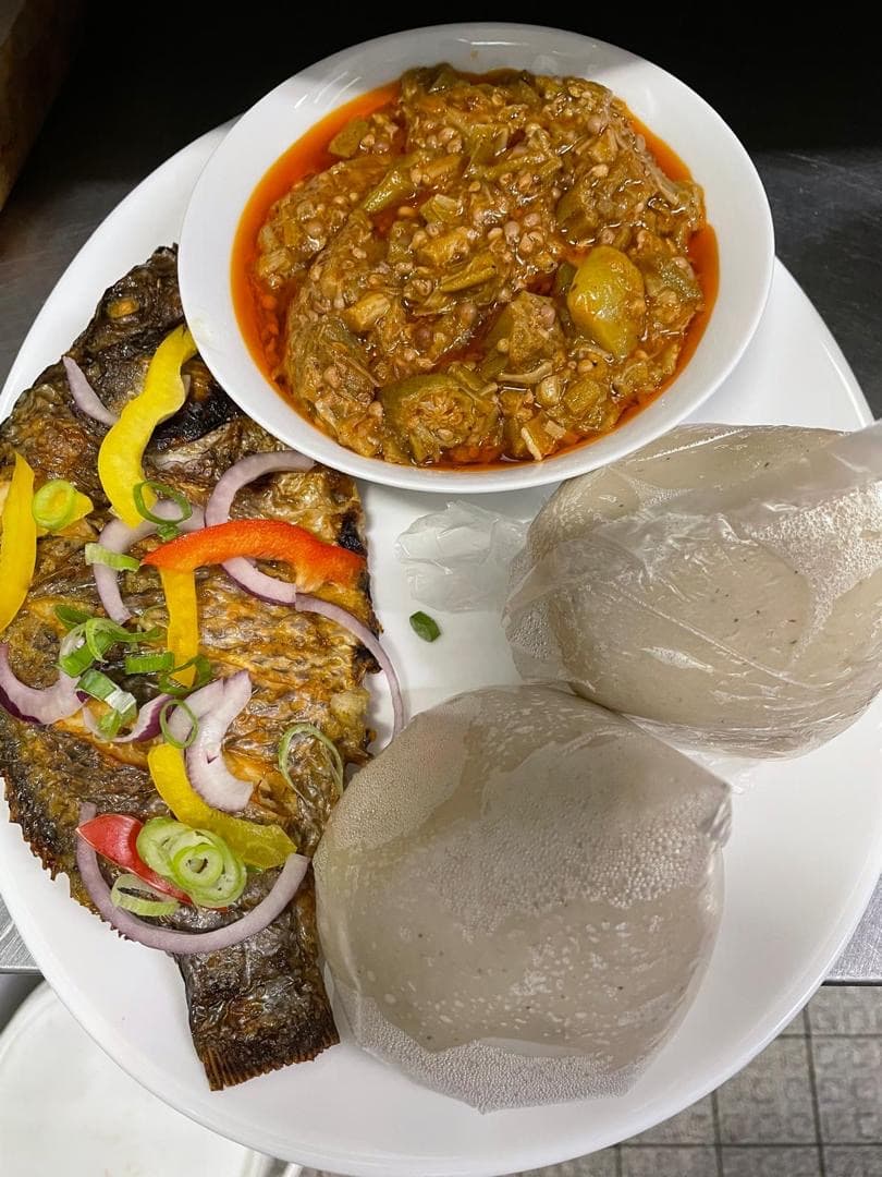 Banku with grilled tilapia and okro stew